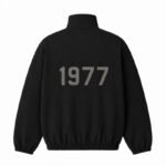 Fear of God Essentials 1977 Jacket Black Back View – Flocked 1977 Logo