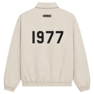 Fear of God Essentials 1977 Jacket Eggshell Off-White Back View – Flocked 1977 Logo