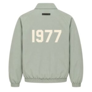 Fear of God Essentials 1977 Jacket Seafoam Back View – Flocked 1977 Logo