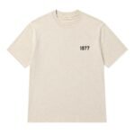 Fear of God Essentials 1977 T-Shirt – Oatmeal