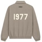 Fear of God Essentials 1977 Jacket Dark Oatmeal Back View – Flocked 1977 Logo